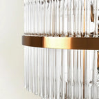 Lustre moderne en verre transparent avec finition dorée