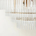 Lustre moderne en verre transparent avec finition dorée