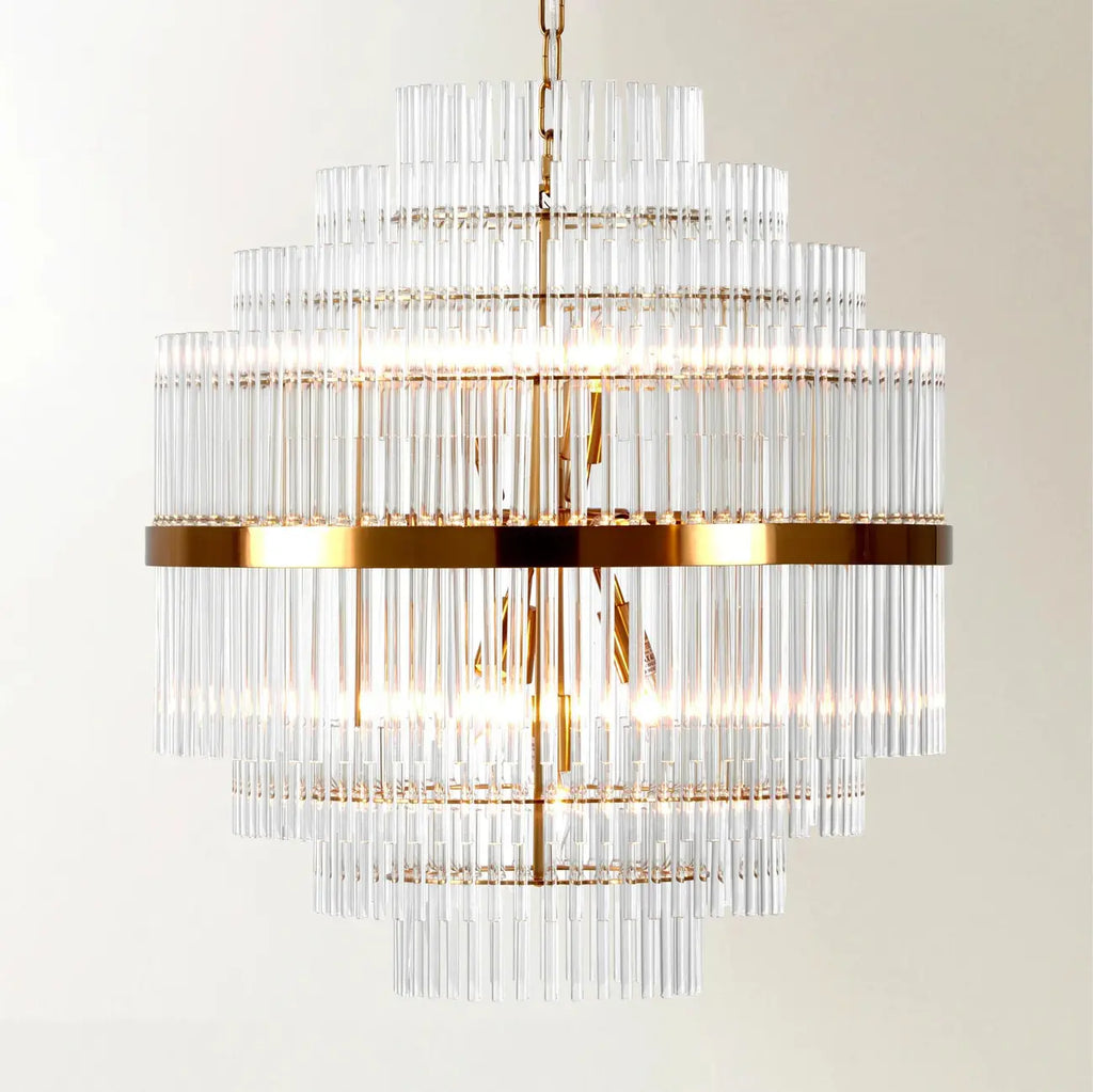 Lustre moderne en verre transparent avec finition dorée