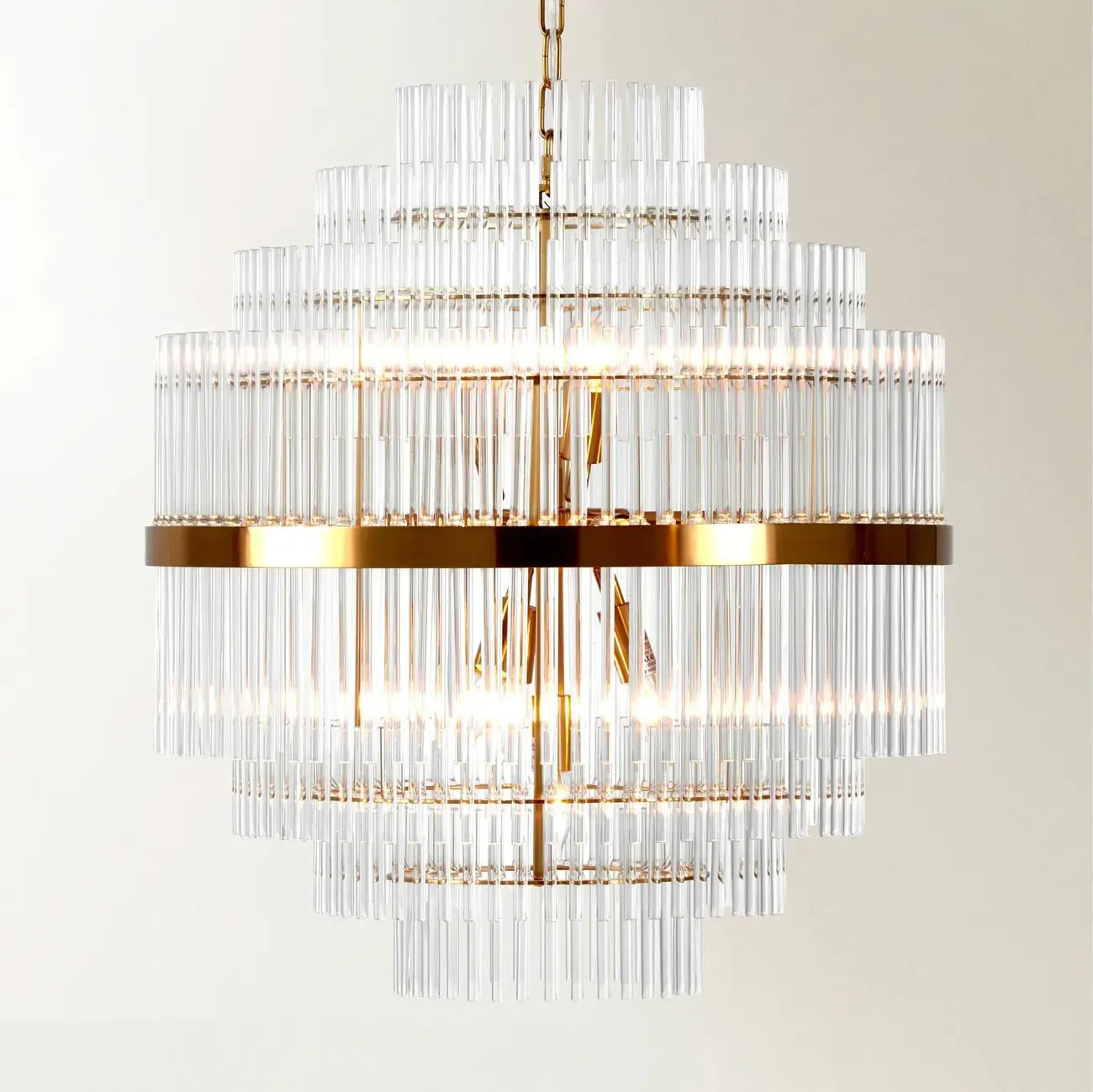 Lustre moderne en verre transparent avec finition dorée