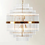 Lustre moderne en verre transparent avec finition dorée