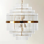 Lustre moderne en verre transparent avec finition dorée