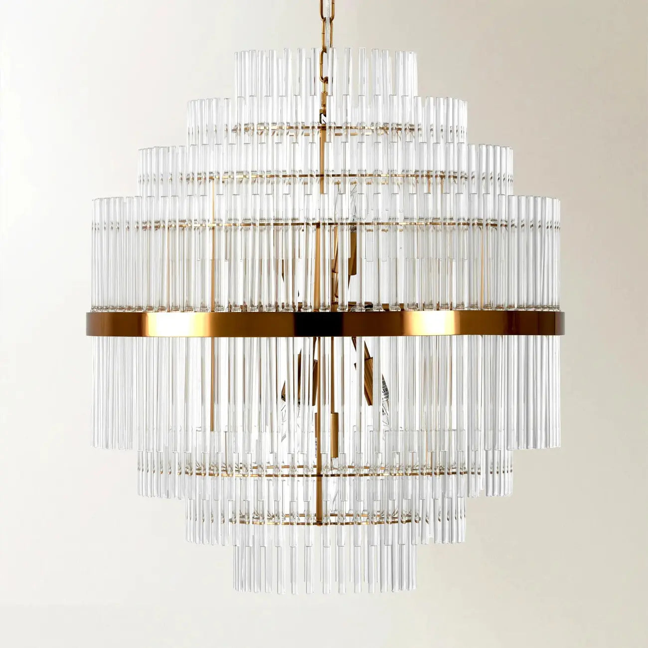 Lustre moderne en verre transparent avec finition dorée