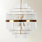 Lustre moderne en verre transparent avec finition dorée
