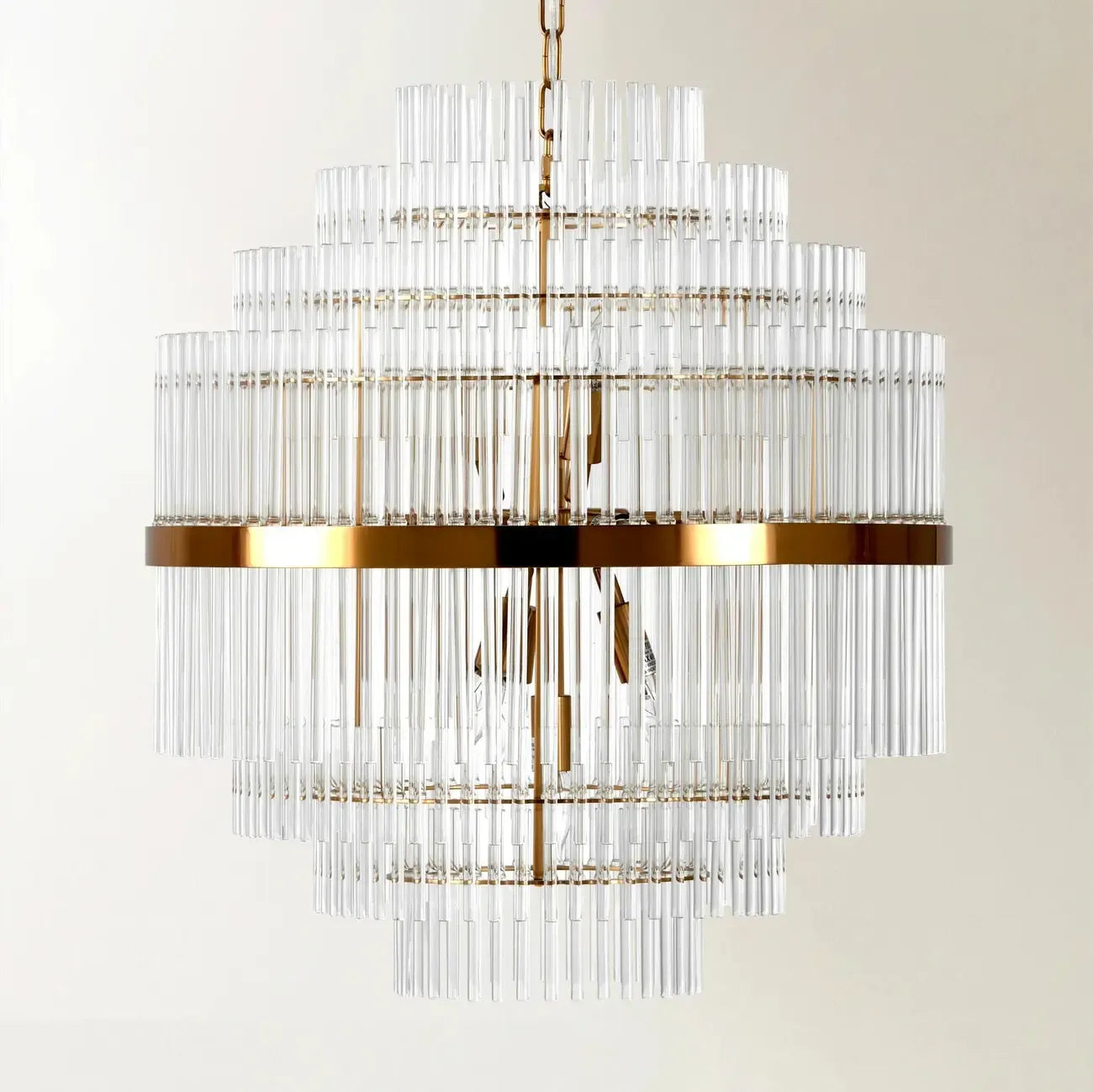 Lustre moderne en verre transparent avec finition dorée