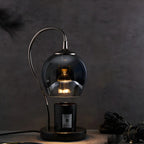 Lampe de table moderne en métal noir et verre avec socle porte-gobelet