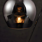 Lampe de table moderne en métal noir et verre avec socle porte-gobelet