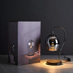 Lampe de table moderne en métal noir et verre avec socle porte-gobelet