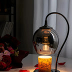 Lampe de table moderne en métal noir et verre avec socle porte-gobelet