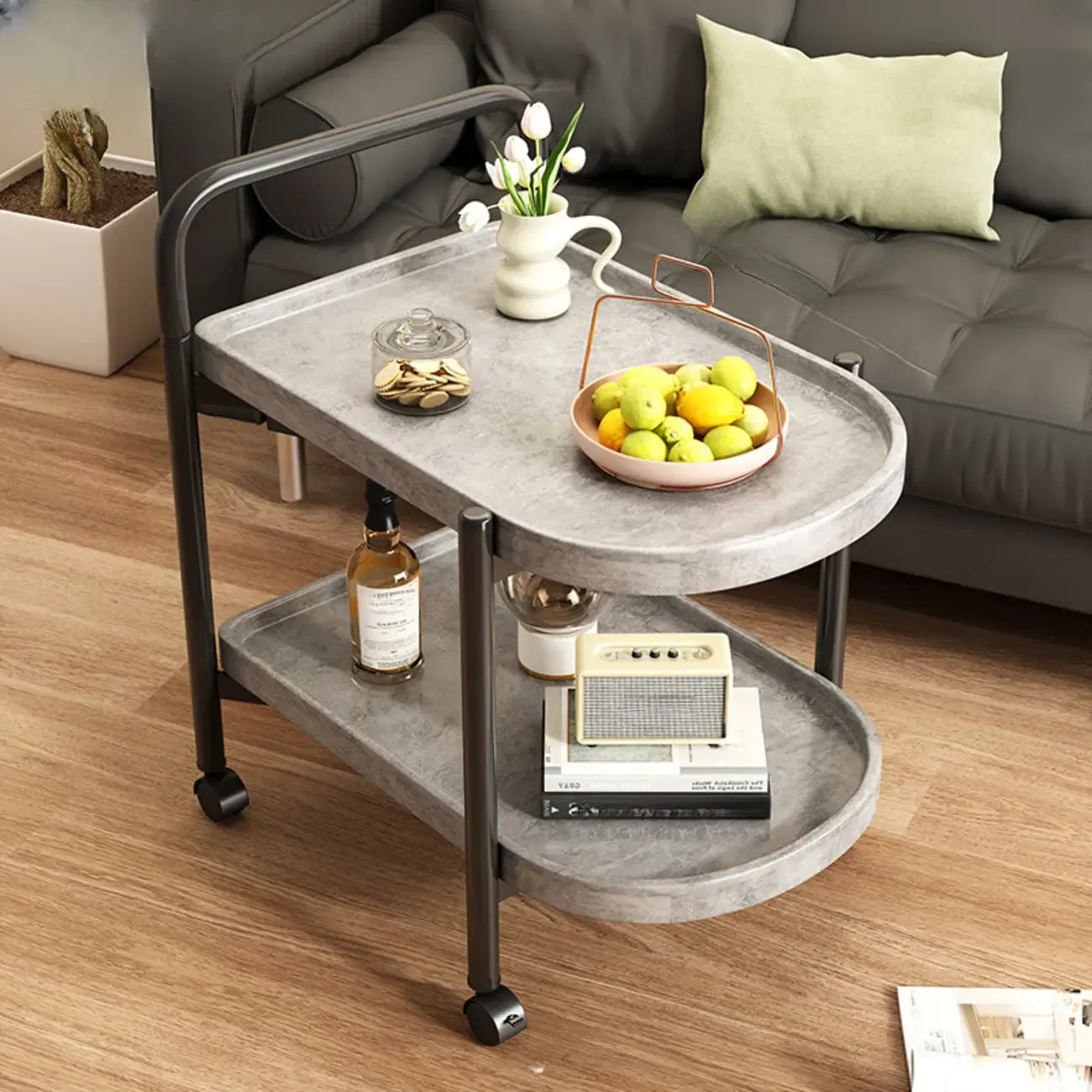Table basse ronde moderne en bois à deux niveaux avec roulettes et plateau