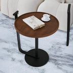 Table basse minimaliste ronde à base en acier pour salon