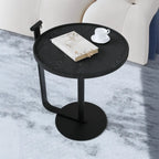 Table basse minimaliste ronde à base en acier pour salon
