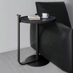 Table basse minimaliste ronde à base en acier pour salon