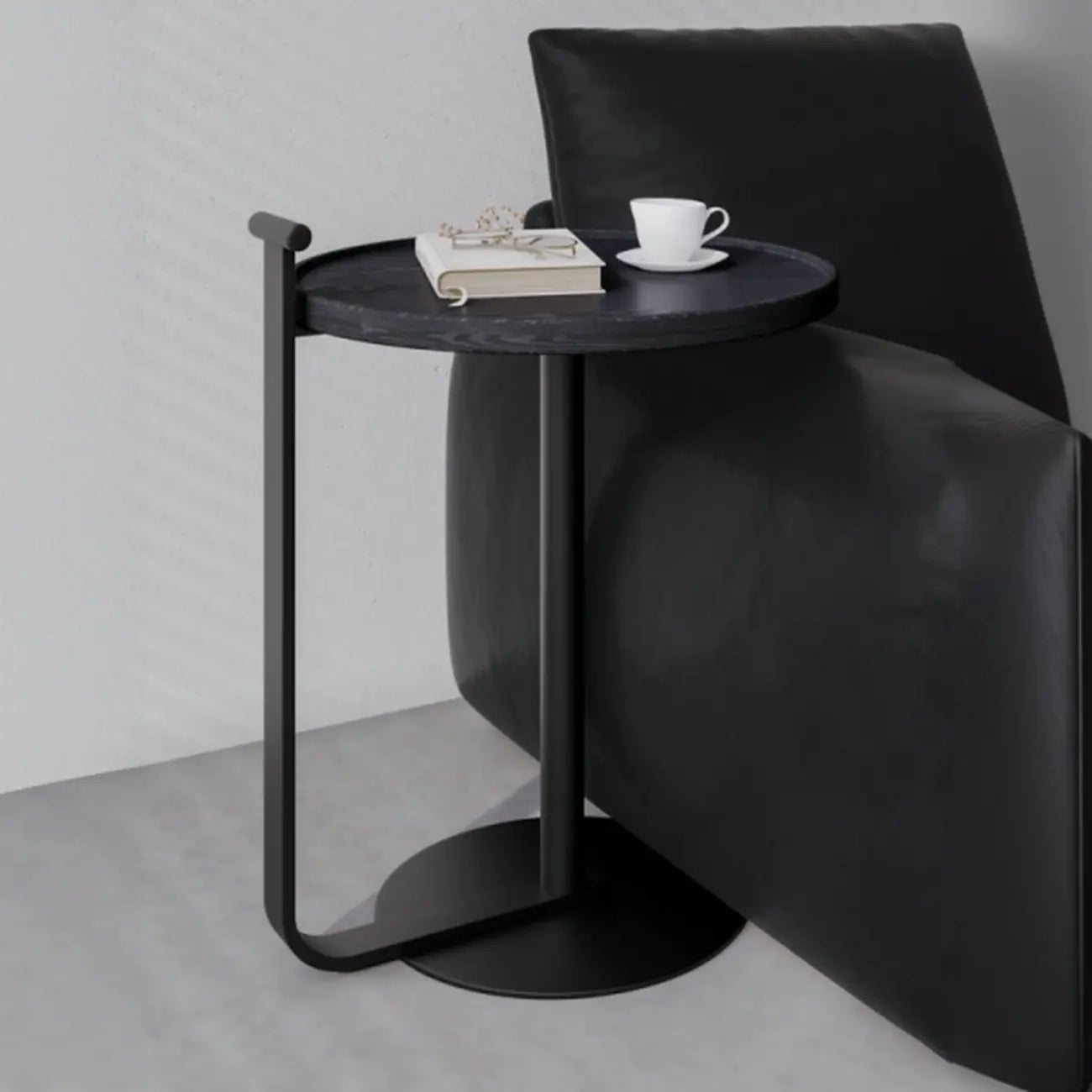 Table basse minimaliste ronde à base en acier pour salon
