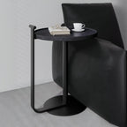 Table basse minimaliste ronde à base en acier pour salon