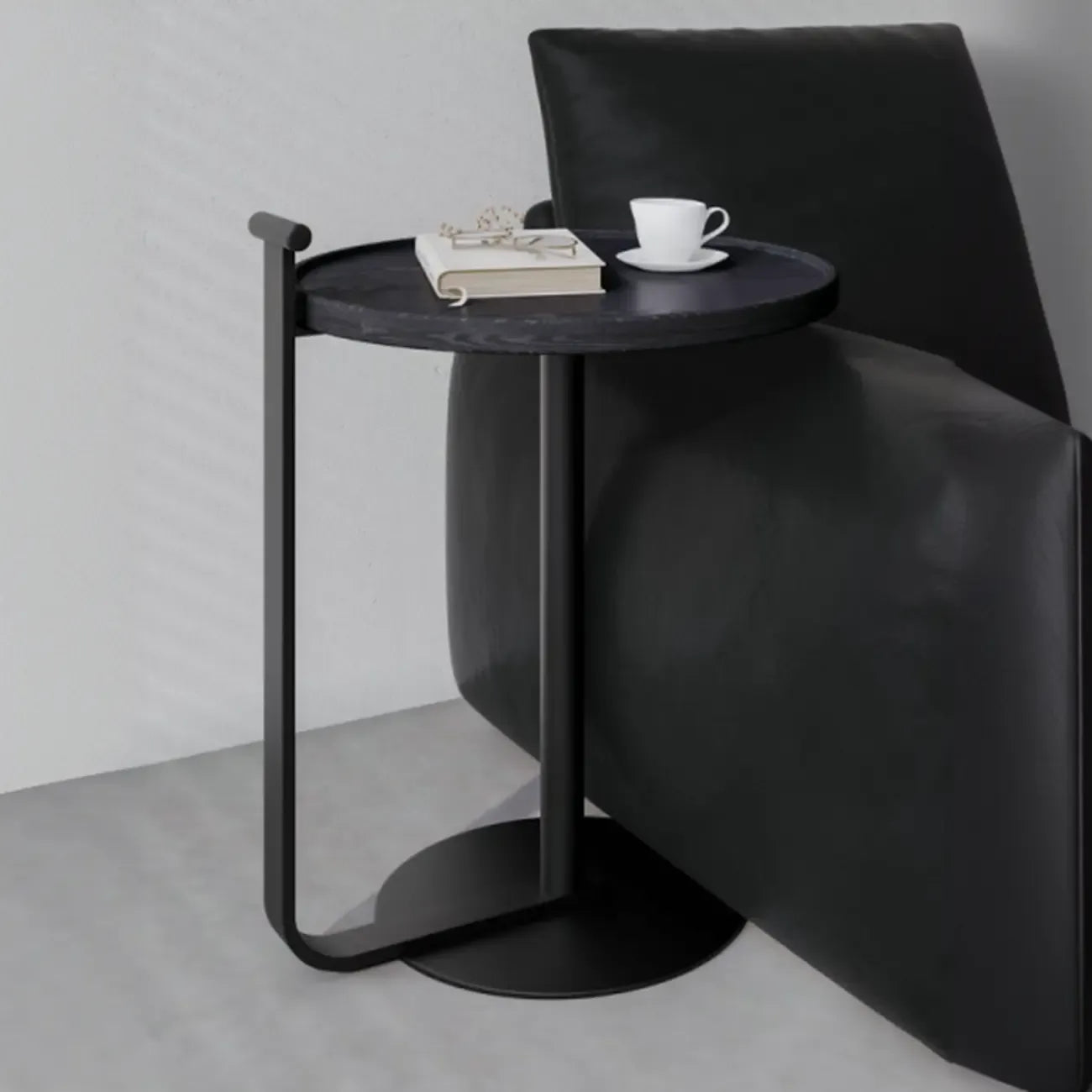 Table basse minimaliste ronde à base en acier pour salon