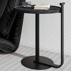 Table basse minimaliste ronde à base en acier pour salon