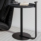 Table basse minimaliste ronde à base en acier pour salon