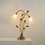 Lampe de table élégante en métal avec abat-jour floral en verre pour usage résidentiel