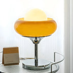Lampe de table simple en verre globe orange pour usage résidentiel
