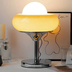 Lampe de table simple en verre globe orange pour usage résidentiel