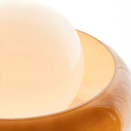 Lampe de table simple en verre globe orange pour usage résidentiel