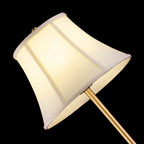 Lampe de table classique blanche à abat-jour géométrique doré pour chambre à coucher