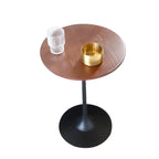 Table d'appoint ronde minimaliste en bois brun avec piètement en métal