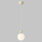 Suspension LED élégante en verre opalin avec détails de perles