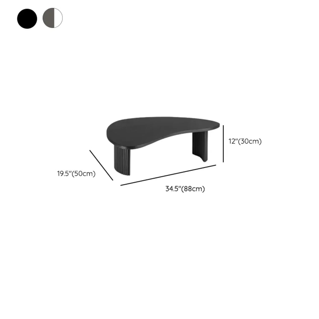 Table basse contemporaine en bois noir de forme unique