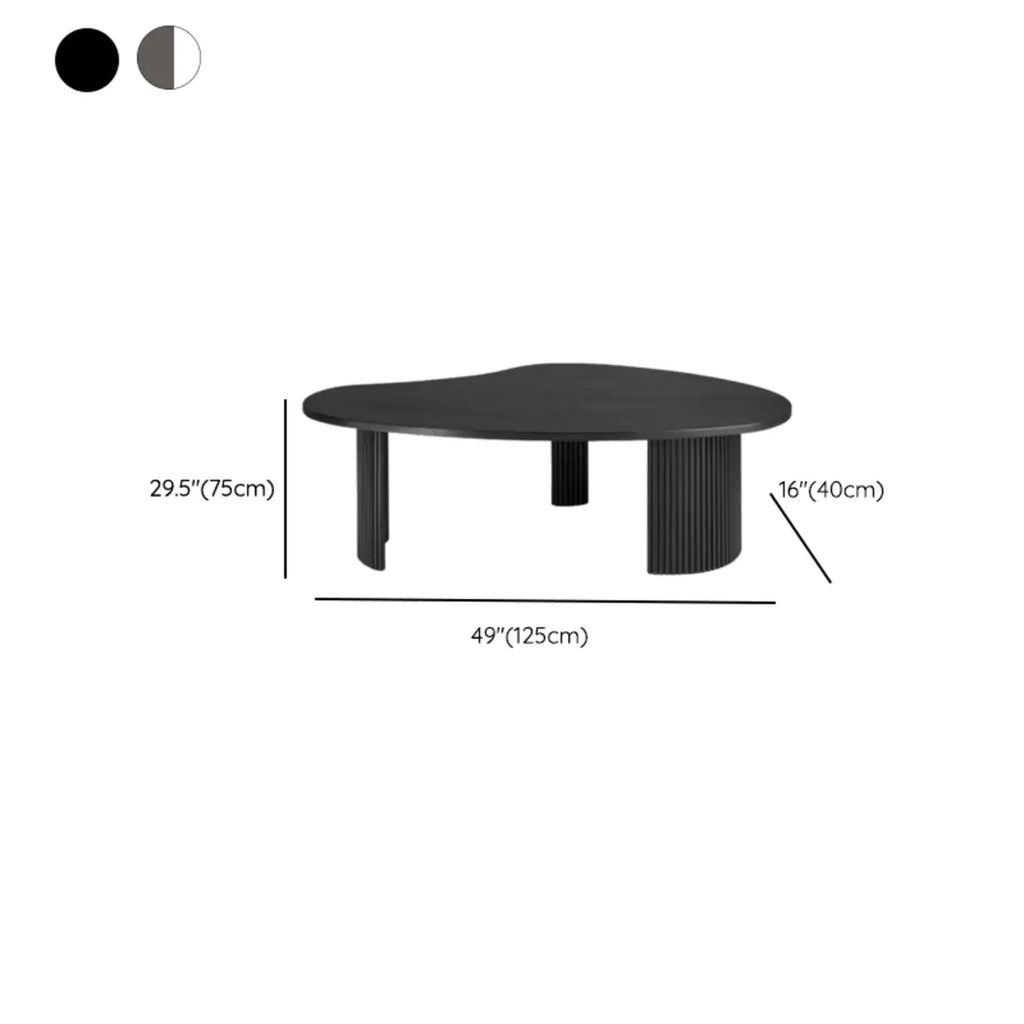 Table basse contemporaine en bois noir de forme unique