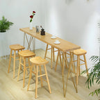 Élégante longue table de bar avec tabourets en bois
