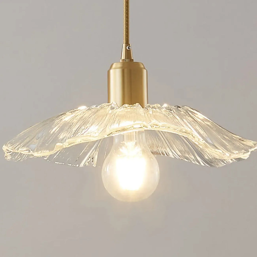 Suspension moderne en verre transparent avec abat-jour marguerite et accessoires dorés