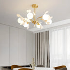 Lustre moderne en laiton à branches au design élégant