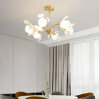 Lustre moderne en laiton à branches au design élégant