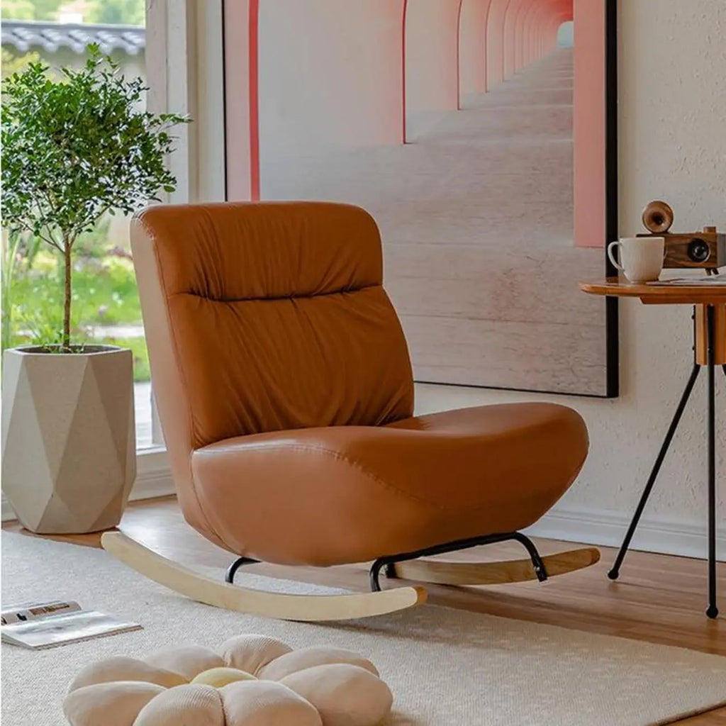 Fauteuil à bascule rembourré en similicuir avec repose-pieds en option