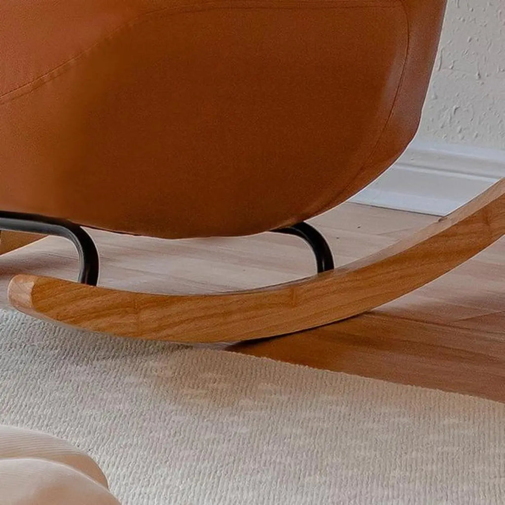 Fauteuil à bascule rembourré en similicuir avec repose-pieds en option