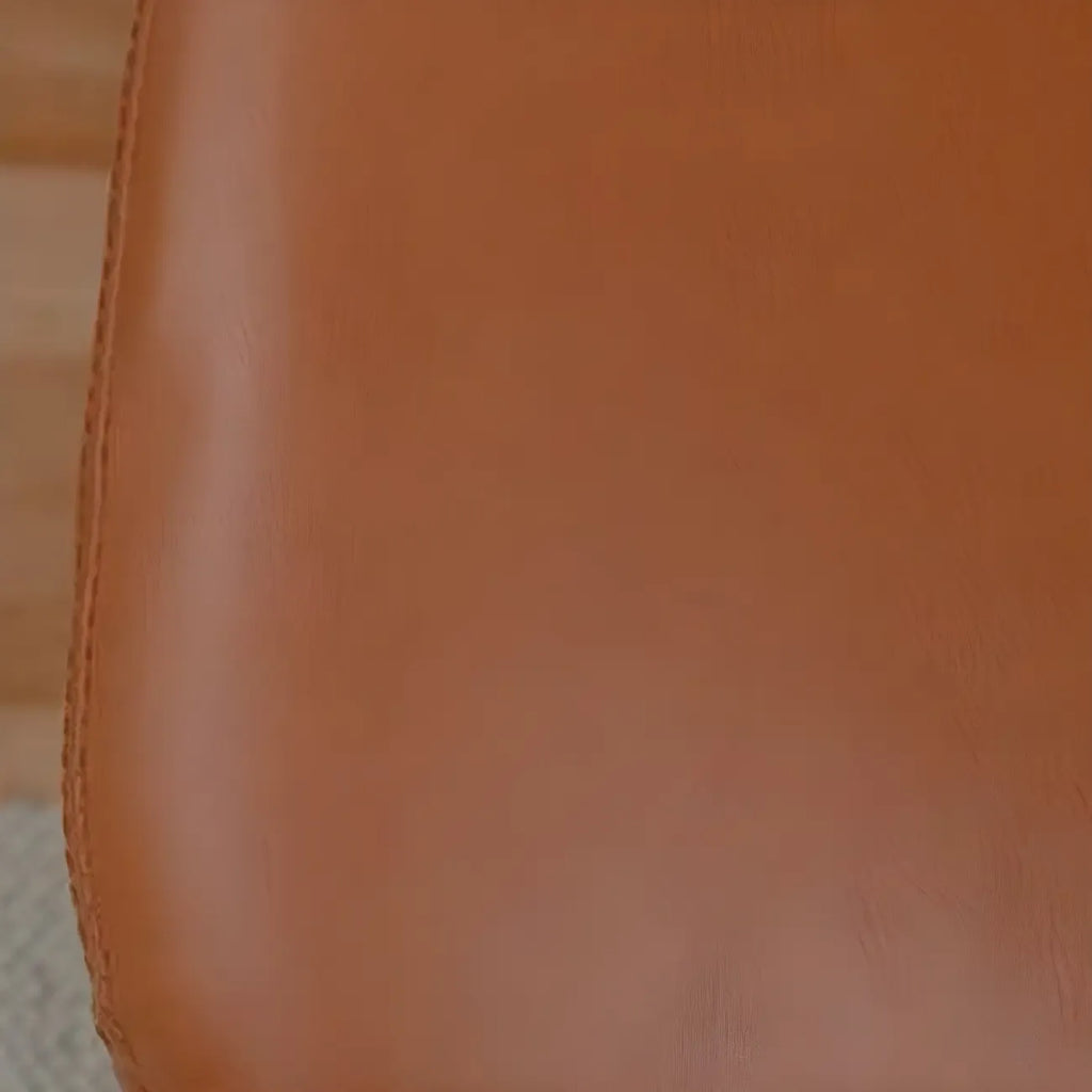 Fauteuil à bascule rembourré en similicuir avec repose-pieds en option