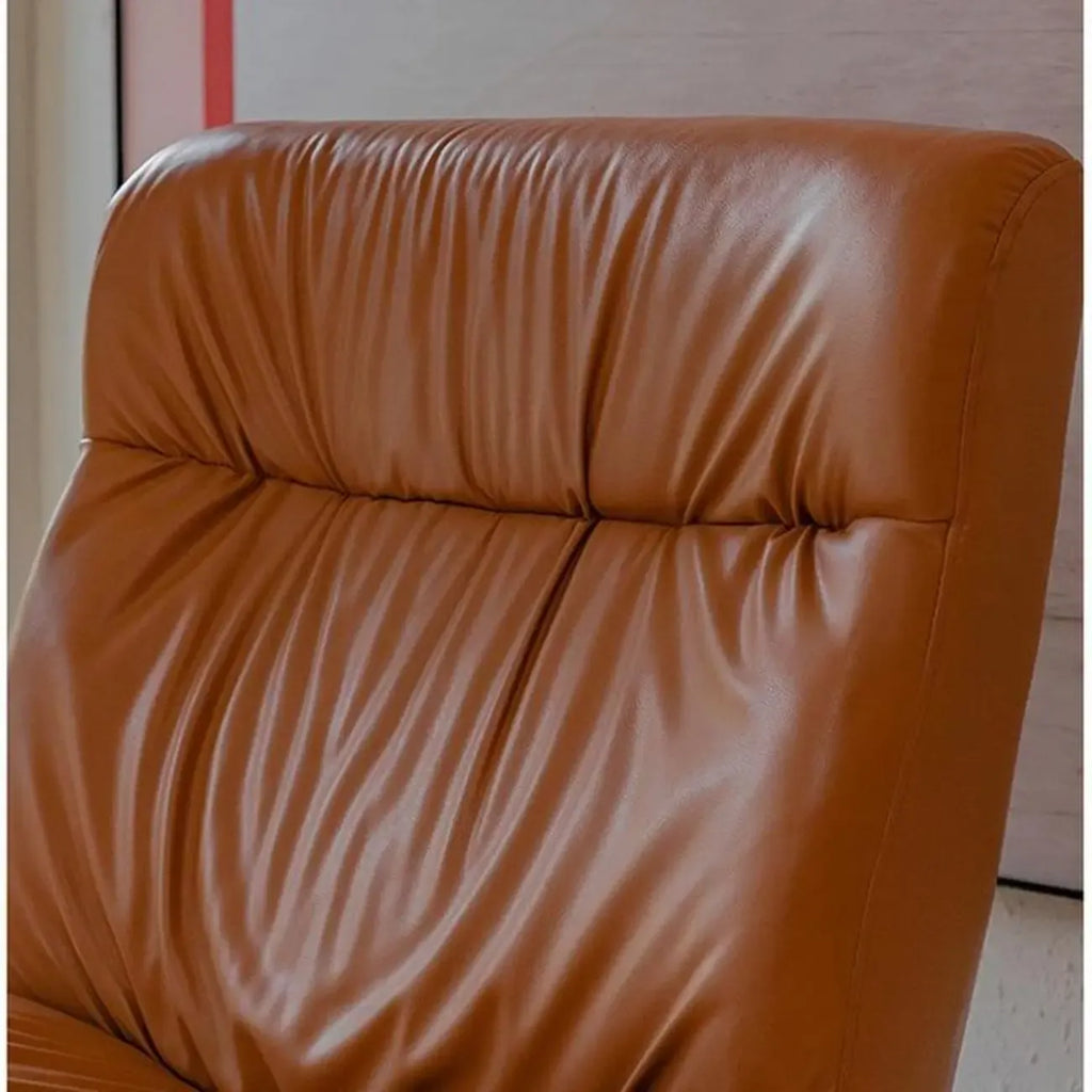 Fauteuil à bascule rembourré en similicuir avec repose-pieds en option