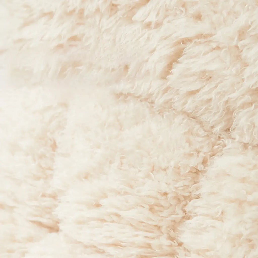 Fauteuil à bascule moderne en métal recouvert de coton blanc