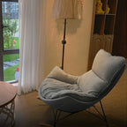 Fauteuil à bascule rembourré de style moderne du milieu du siècle avec repose-pieds