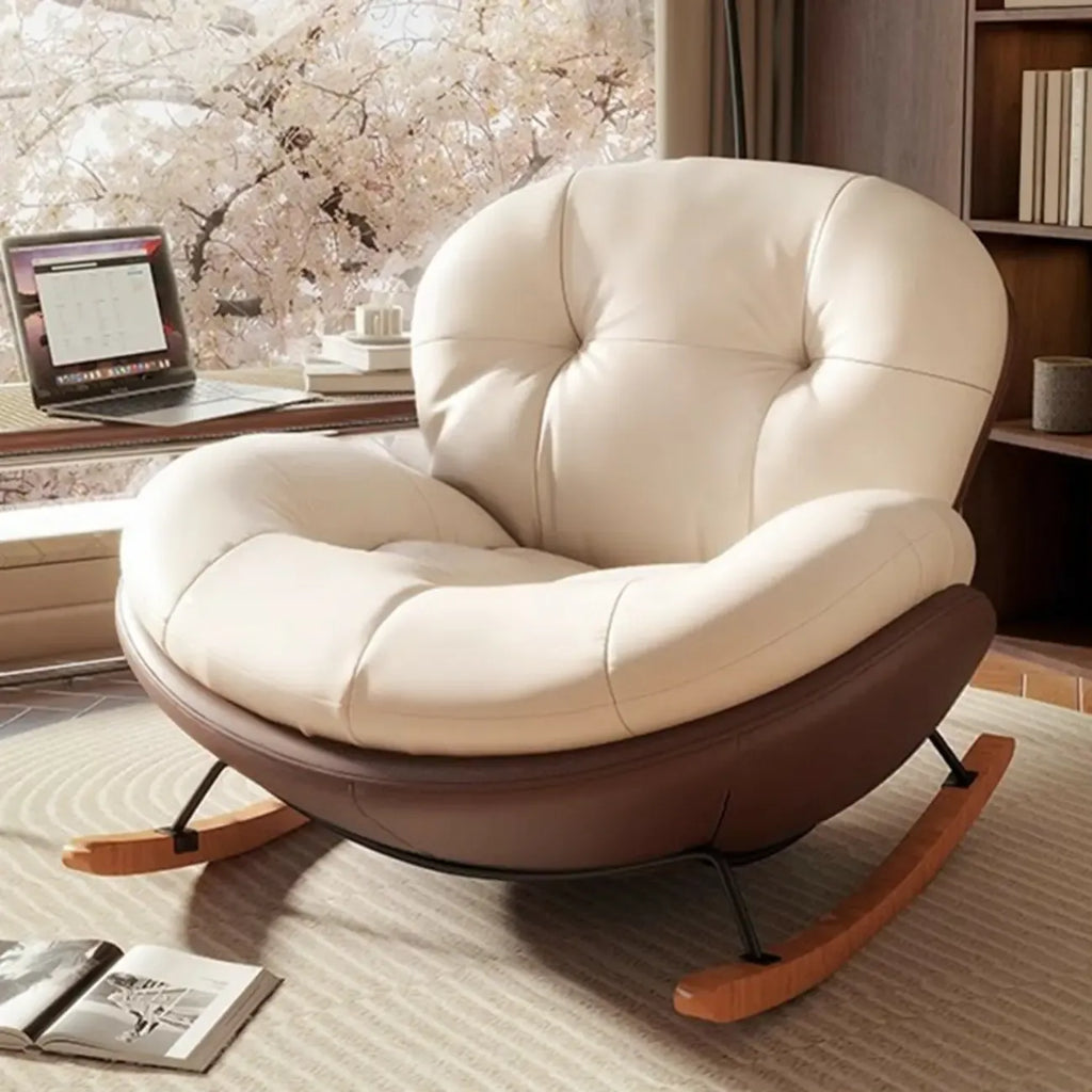 Fauteuil à bascule ergonomique arrondi et rembourré pour salon