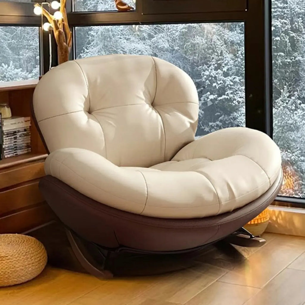 Fauteuil à bascule ergonomique arrondi et rembourré pour salon