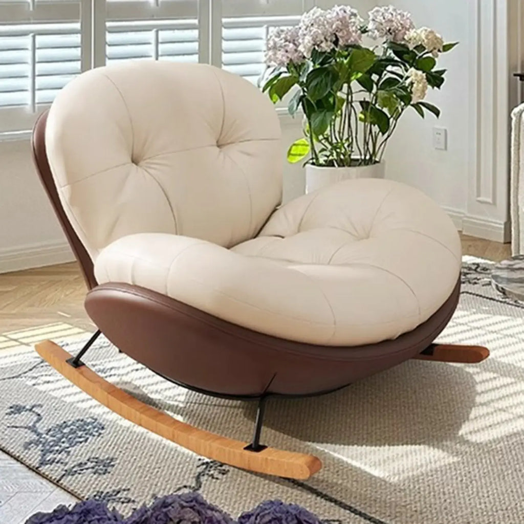 Fauteuil à bascule ergonomique arrondi et rembourré pour salon