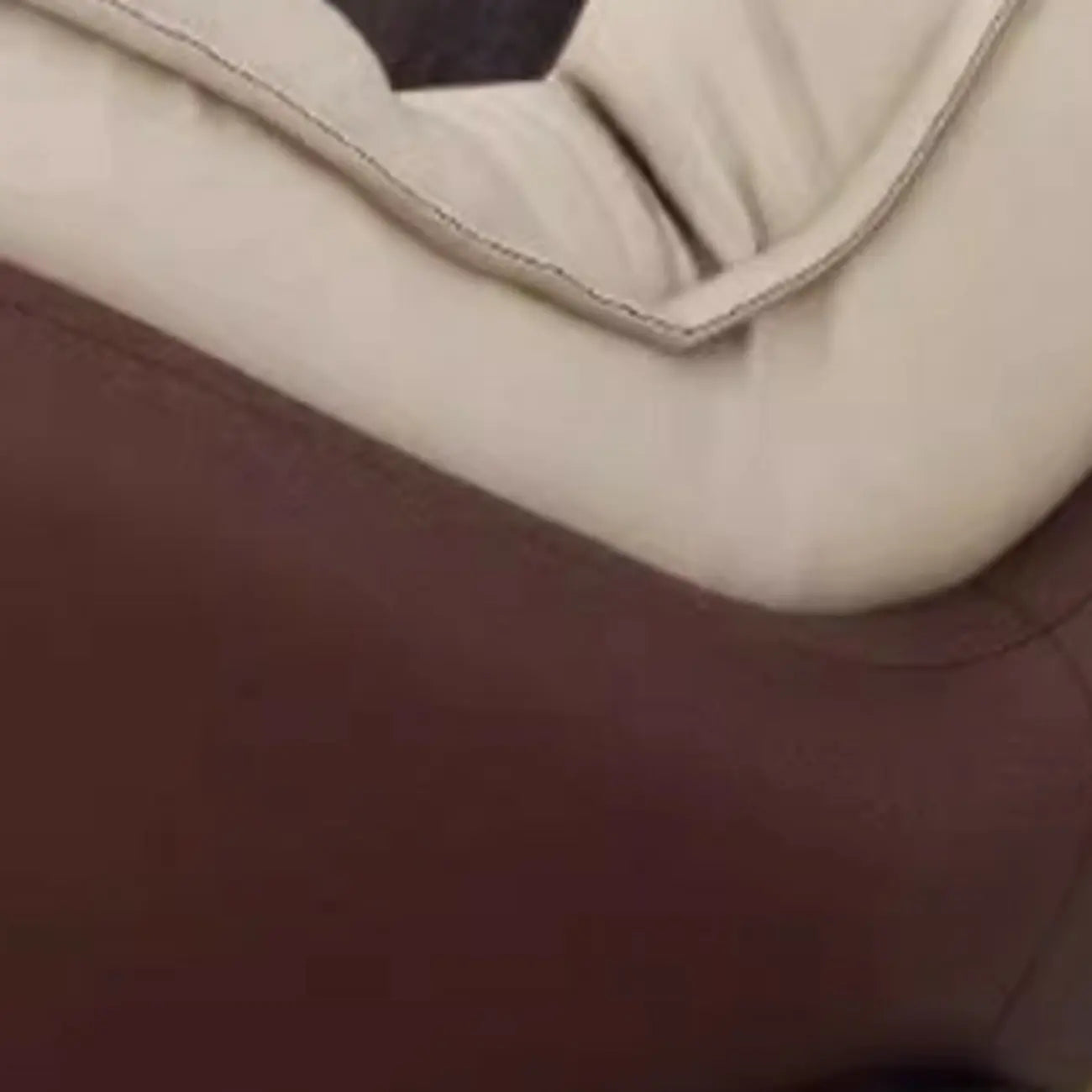 Fauteuil à bascule ergonomique arrondi et rembourré pour salon