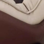 Fauteuil à bascule ergonomique arrondi et rembourré pour salon