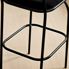 Tabourets de bar minimalistes en cuir avec structure en métal et dossier ajouré