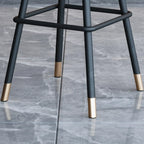 Tabouret de bar minimaliste en métal noir et cuir rembourré