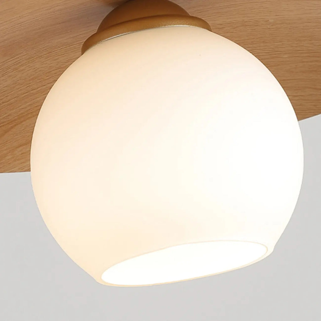 Suspension minimaliste en verre blanc avec disque métallique pour salon