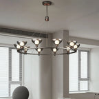 Lustre industriel en métal noir avec abat-jour en verre gris